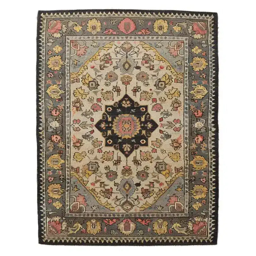 Elegant hand-tufted wool rug showcasing a vibrant medallion design with intricate floral motifs, perfect for large area rugs in living room and dining room settings.
