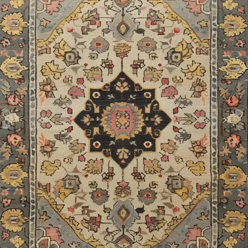 A beautifully intricate hand-tufted wool rug, ideal as a large area rug for living rooms and dining rooms. This Cultural Legacy rug features a rich, traditional pattern with floral motifs in warm tones, perfect for adding elegance to any dining room or as a standout piece in your living room.