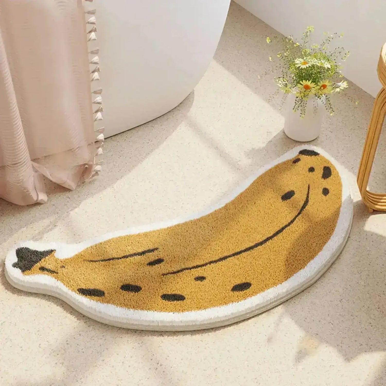 Charming banana-shaped area rug in a cozy room setting, featuring a playful design with yellow and brown tones, perfect for adding a whimsical touch to any space.