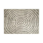 Top view of the Cyclic Whisper Knotted Wool Area Rug showcasing a concentric circular pattern in neutral tones, perfect for adding an elegant touch to any room.