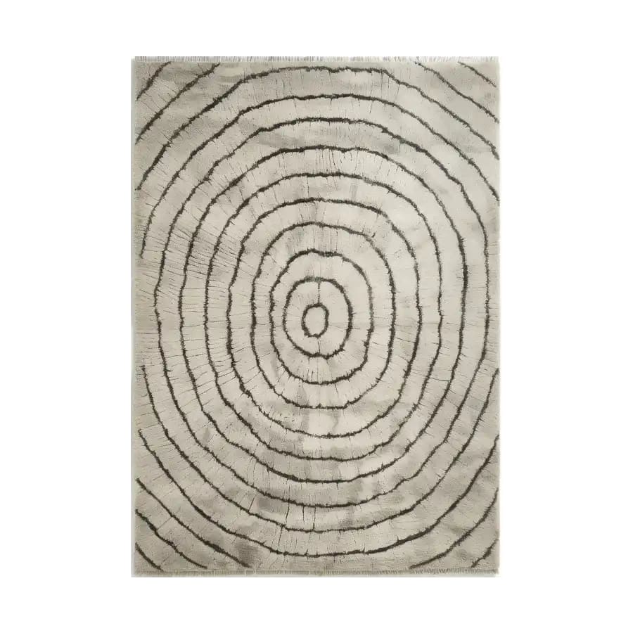 The Cyclic Whisper Knotted Wool Rug showcases an intricate, concentric circle pattern in soft shades, perfect for adding elegance to any room. This area rug combines modern design with a classic wool texture, ideal for enhancing home decor.