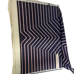 Dark teal geometric area rug with a modern pattern, perfect for enhancing living room and dining room spaces. This hand-tufted wool rug features clean lines and a contemporary design, ideal for formal dining room settings.