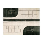 This image showcases the Dark Wave Symphony Knotted Wool Rug, featuring an abstract design with geometric patterns in black and cream. The area rug displays a modern aesthetic with bold shapes and lines, perfect for contemporary home decor.