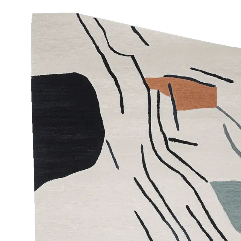 A contemporary hand-tufted wool area rug with an abstract design featuring bold black, brown, and gray shapes on a cream background. Perfect for adding a modern touch to your living room.