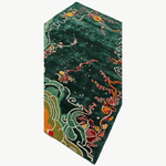 Decorative tie with intricate patterns on a green background