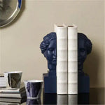 Colorful paint-drip classical male bust with multicolor drips on white resin pedestal, side view