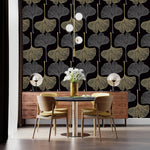 Dining nook with Golden Gingko Grove Wallpaper, dark table and tan chairs