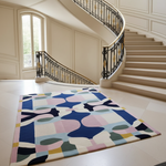 contemporary wool rug by the spiral stair