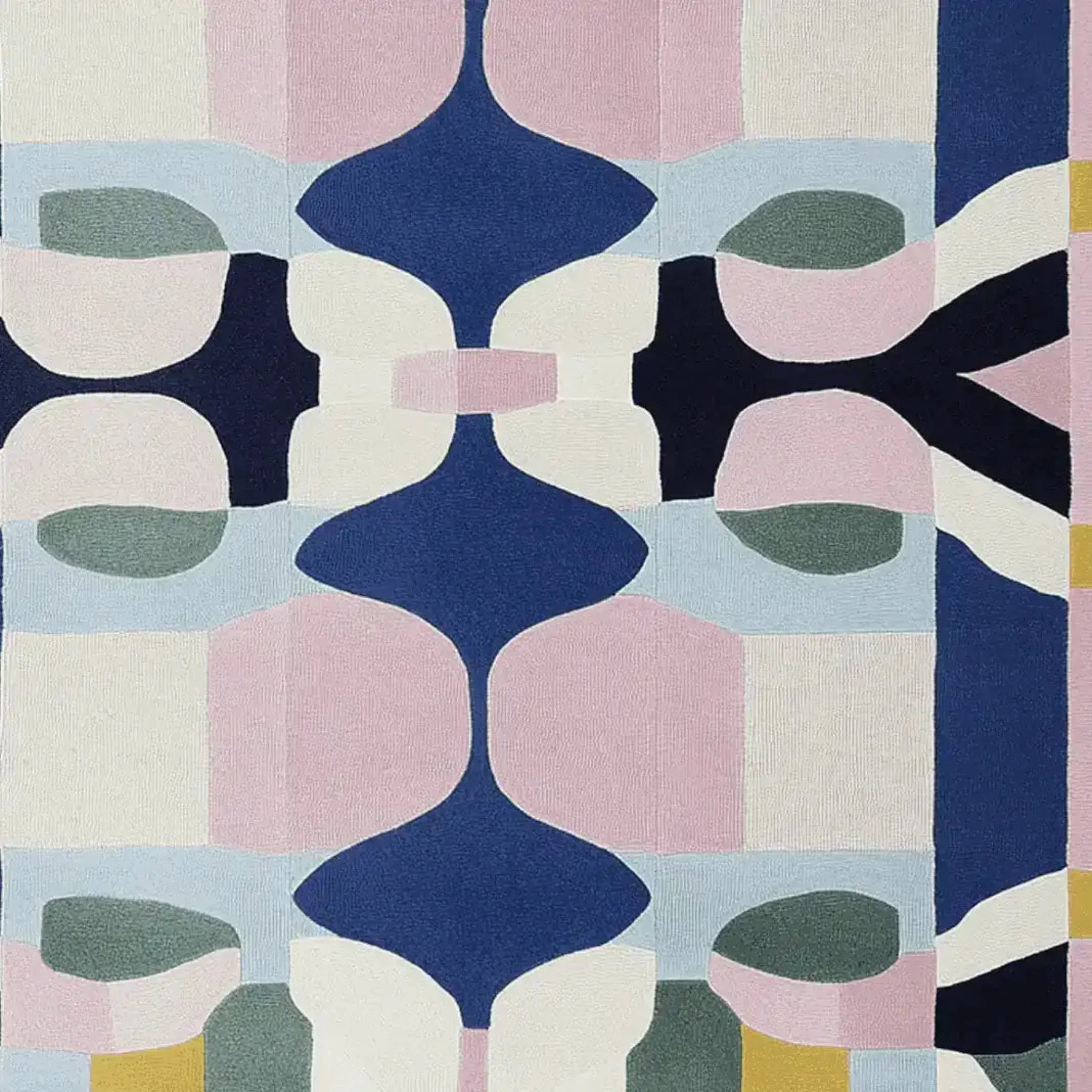 Top view of a vibrant area rug featuring a contemporary design with abstract geometric patterns in blue, pink, and green hues. This hand-tufted wool rug is perfect for adding a stylish touch to living room area rugs.