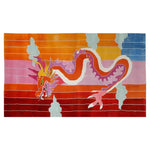 Vibrant area rug featuring an abstract dragon design in bold colors, perfect for adding a unique touch to rugs for living room. This hand-tufted wool rug showcases a mix of orange, pink, red, and blue hues, creating a captivating visual appeal.