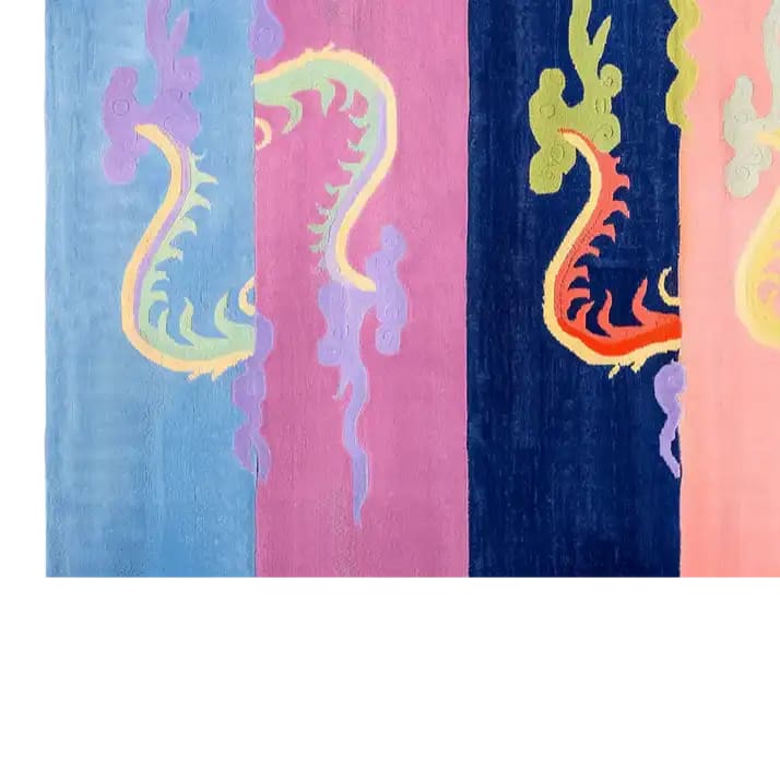 Vibrant area rug featuring an abstract dragon design with bold colors including blue, pink, and orange. The hand-tufted wool rug showcases a unique artistic pattern that adds a touch of elegance and creativity to any room.