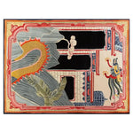 This vibrant area rug, titled 'Dragon Temple Vista Hand Tufted Wool Rug', features an intricate design with a majestic dragon motif. The detailed patterns include bold colors and ornate borders, creating a striking visual impact perfect for enhancing any room.