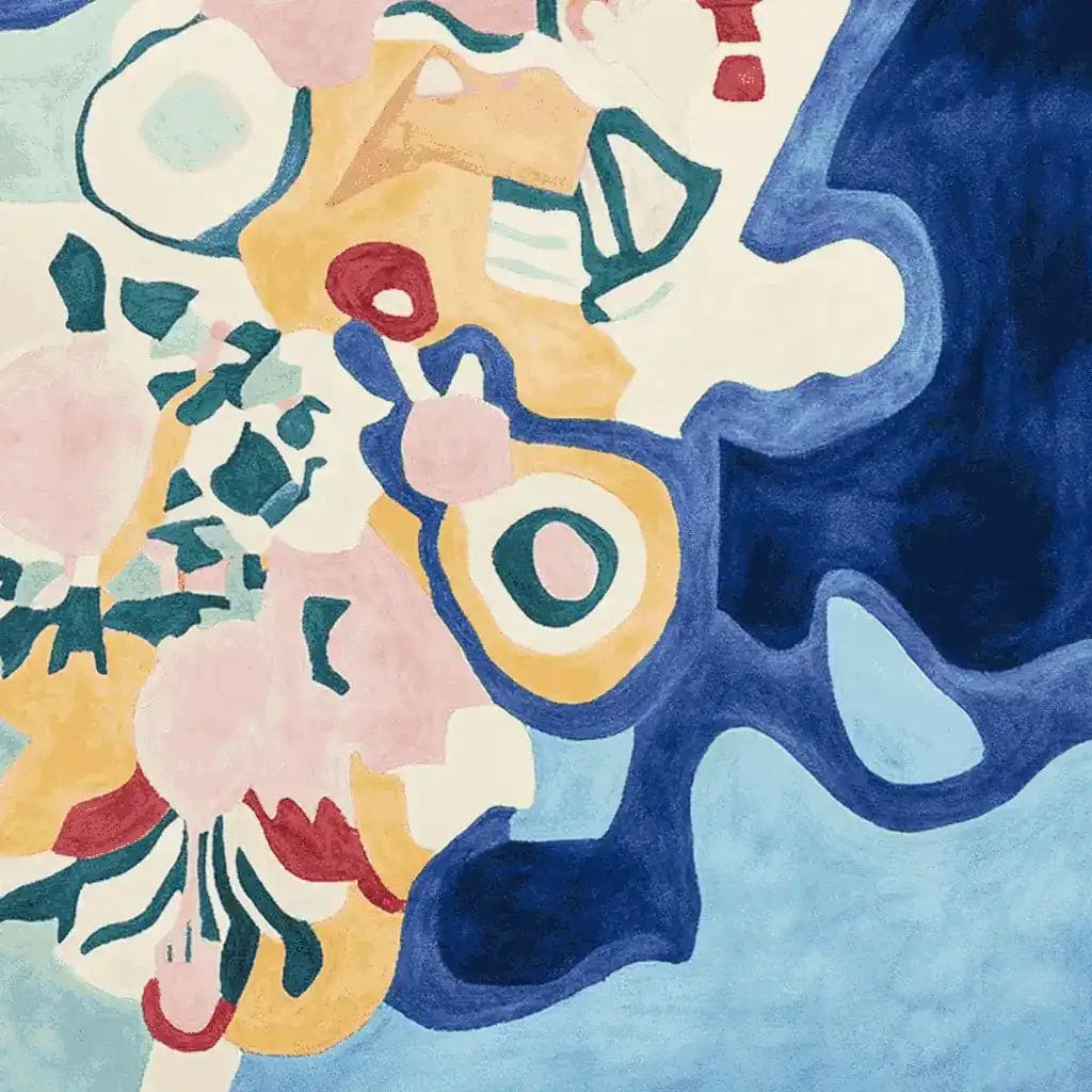 This vibrant Dream Flora Sequence Hand Tufted Area Rug showcases an abstract, contemporary design with bold colors like blue, pink, and yellow. Perfect for adding a splash of creativity to your living room, this wool rug combines modern artistry with the comfort of soft textures, making it an ideal choice for rugs for living room.