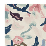 This image showcases a close-up view of the Dreamscape Mosaic Hand Tufted Area Rug, perfect for adding a touch of elegance to your living room. The contemporary rug features an abstract design with soft, blended colors including blue, pink, and cream, making it a stylish choice for living room rugs 8x10. Crafted from high-quality wool, this rug not only enhances the aesthetic appeal but also offers comfort and durability.