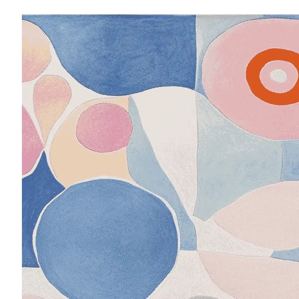 A stunning area rug featuring an abstract, contemporary design with vibrant circles and shapes in shades of blue, pink, and orange. This wool rug is perfect for adding a modern touch to large living room spaces, creating a bold centerpiece in any decor.