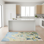 Kitchen with a floral rug on the floor