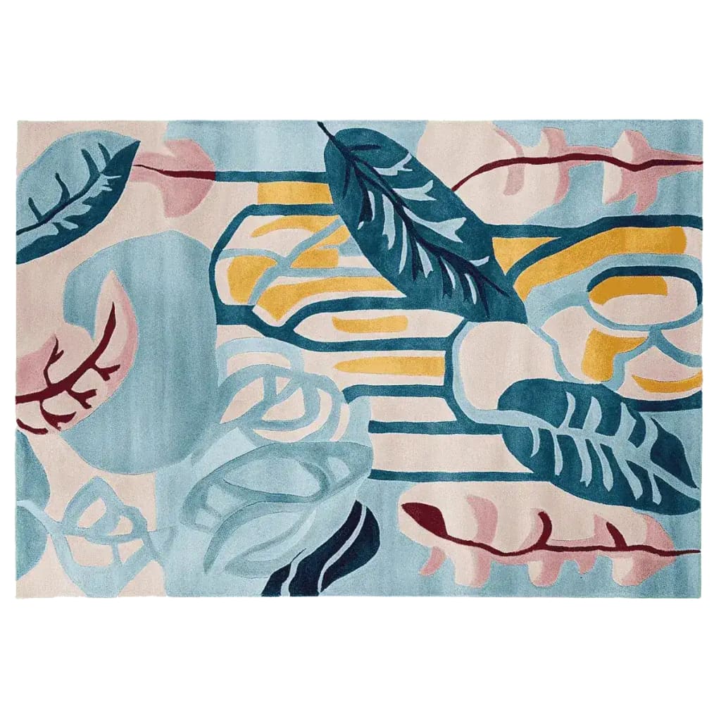 A contemporary area rug featuring an abstract design with bold, colorful leaf patterns in blue, pink, and yellow, perfect for large living rooms. This wool rug, titled 'Drift Leaf Riff Hand Tufted Rug', adds a modern touch to any living room area.