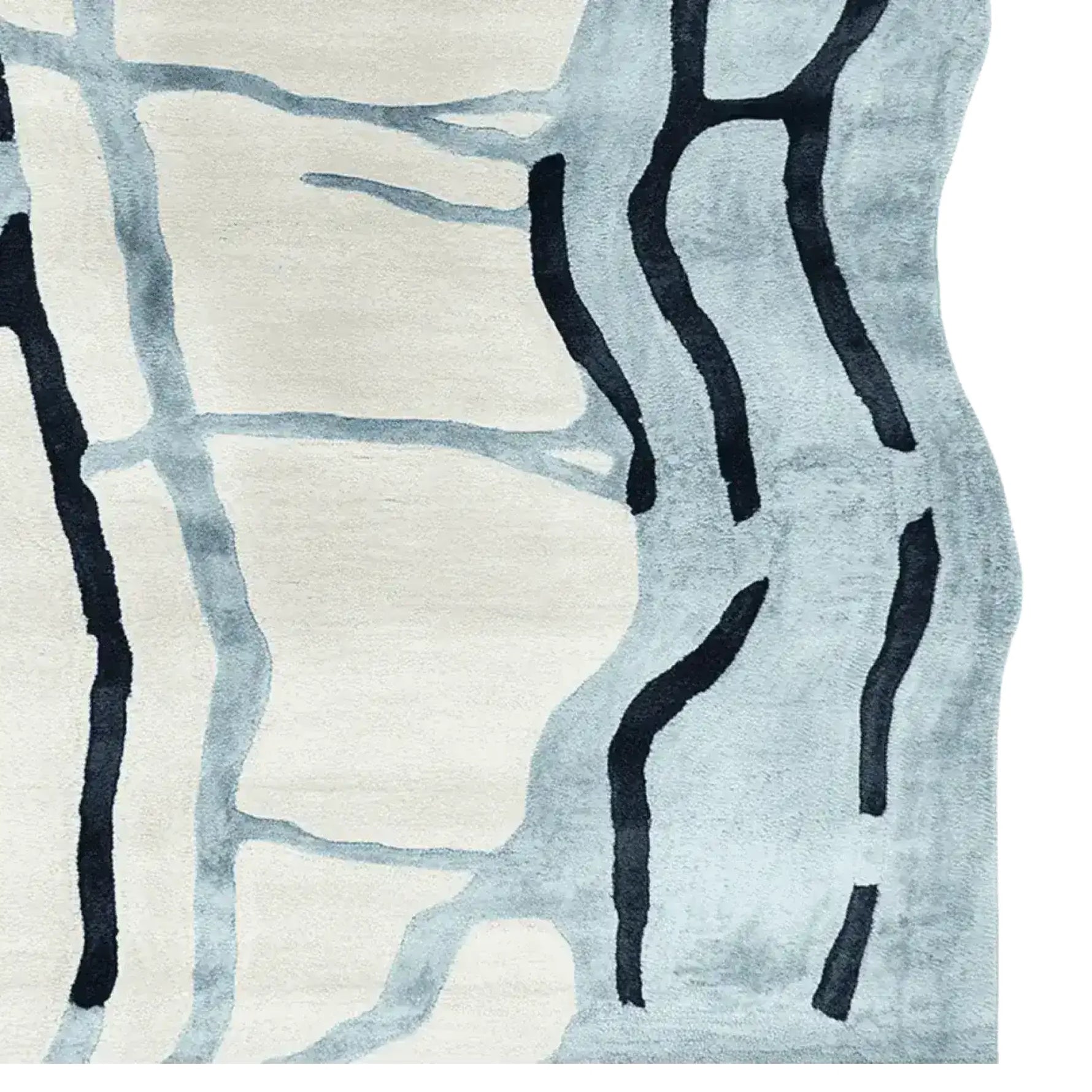 Top view of the Drifting Lines Hand Tufted Area Rug showcasing an abstract design with flowing dark lines on a light background. This contemporary wool rug is perfect for large living rooms, adding a modern touch to any space.