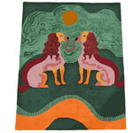 A contemporary hand-tufted area rug featuring an abstract design with two stylized creatures facing each other. The rug showcases vibrant colors, ideal for adding a bold statement to a bedroom or office. Made from high-quality wool, this rug combines artistic flair with durability, perfect for modern office spaces or as a unique bedroom accent.