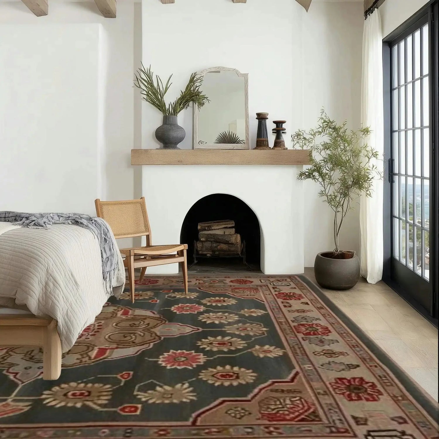 A cozy living room featuring a Dusk Blossom Hand Knotted Area Rug with intricate Persian-inspired patterns. The wool rug, in warm and earthy tones, complements the serene ambiance of the large space. Natural light floods through the windows, highlighting the rug’s detailed design.