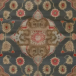 Close-up view of the Dusk Blossom Hand Knotted Area Rug showcasing its intricate Persian-inspired design with floral motifs. Perfect for enhancing the elegance of a living room, this large wool rug is a stunning example of traditional craftsmanship.