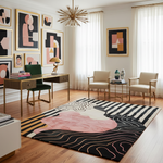 Modern living room with abstract art, a rug, and furniture.