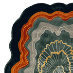 Top view of the Earth Rift Flow hand-tufted area rug, showcasing its contemporary design with bold, abstract layers of deep orange, gray, and black. Perfect as a large living room rug, this wool rug adds a modern touch to any space, ideal for those seeking rugs for living room aesthetics.