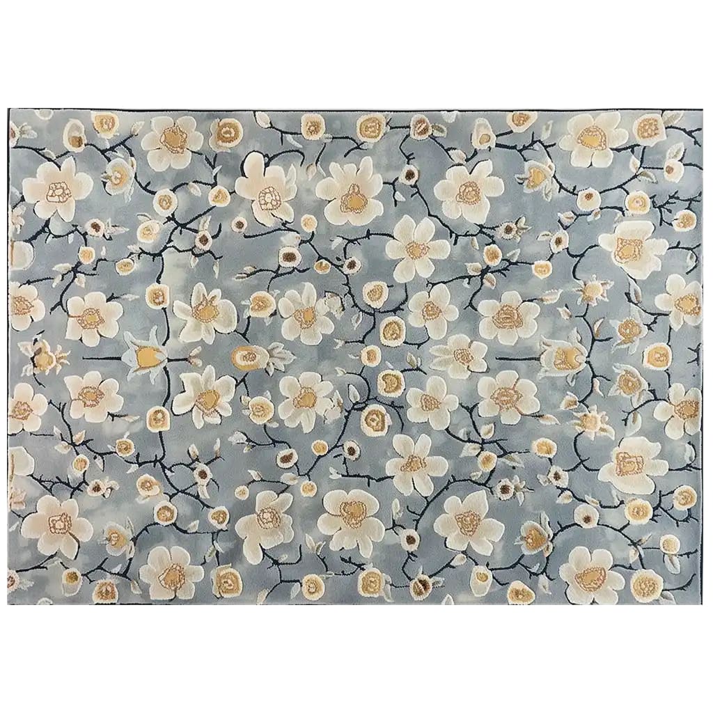 Top view of the Eastern Tranquility Hand Tufted Wool Area Rug, showcasing a serene floral pattern with delicate cream and beige blossoms on a soft blue background. This elegant area rug adds a touch of tranquility and style to any room.