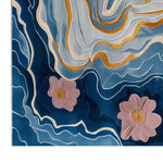 Vibrant Ebb and Bloom Hand Tufted Wool Area Rug featuring abstract blue waves and pink floral patterns. The intricate design adds a touch of elegance and modernity to any room decor.