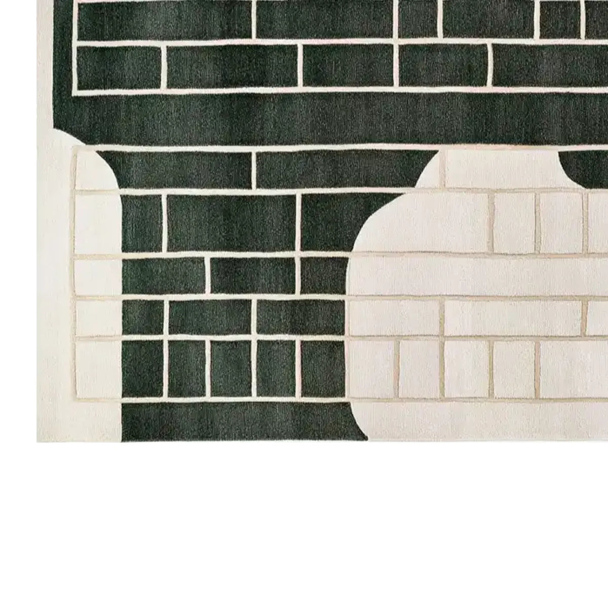 Close-up view of the Ebony Lattice Dream Knotted Wool Area Rug showcasing a bold geometric pattern. The rug features dark and light rectangular blocks creating an eye-catching contrast, perfect for modern decor.