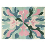 A beautifully designed Echo Floral Fade Hand Tufted Area Rug featuring an intricate floral pattern in soft pink, green, and blue hues. This contemporary rug is perfect for large living room spaces, adding a touch of elegance with its high-quality wool material.