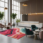 Modern interior design of a lobby with colorful rug, chairs, and reception desk.