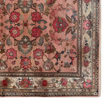 Top view of the Echoes of Eden Knotted Wool Rug featuring a vibrant floral design in warm tones. This area rug is perfect for adding a touch of elegance and warmth to any living room, making it a standout choice among floral rugs and area rugs for living room settings.