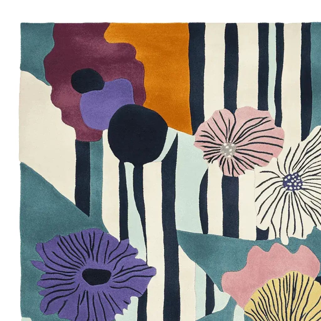 Top view of the Eclectic Bloom Hand Tufted Area Rug, showcasing a vibrant abstract floral design with bold colors. Perfect for those seeking contemporary rugs for living room spaces, this large living room rug is crafted from high-quality wool, offering both style and comfort.