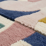 Ecstatic Signal Collapse Hand Tufted Area Rug featuring an abstract design with bold, colorful shapes and stripes. Perfect for adding a contemporary touch to your living room, this 8x10 wool rug combines artistry with comfort, making it an ideal choice for those seeking stylish rugs for living room spaces.
