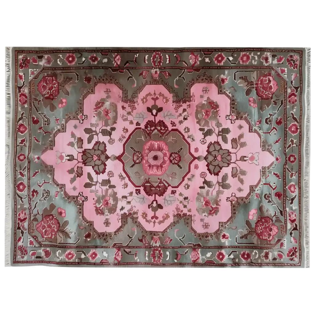 Top view of Eden’s Canvas Knotted Wool Area Rug featuring a vibrant floral pattern in shades of pink and red against a gray background, with intricate detailing and fringed edges.
