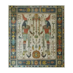 The Egyptian Elegance Hand Knotted Area Rug features a vibrant, intricate design inspired by ancient Egyptian art. With vivid colors and detailed patterns, this area rug showcases two symmetrical figures surrounded by hieroglyphics and floral motifs, adding a touch of historical charm and cultural elegance to any room.