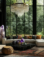 Luxurious living room featuring the Egyptian Enigma Wool Hand Knotted Area Rug. This vintage rug adds a touch of elegance to the space, with its intricate patterns complementing the modern decor. Perfect for those seeking stylish rugs for living room settings.