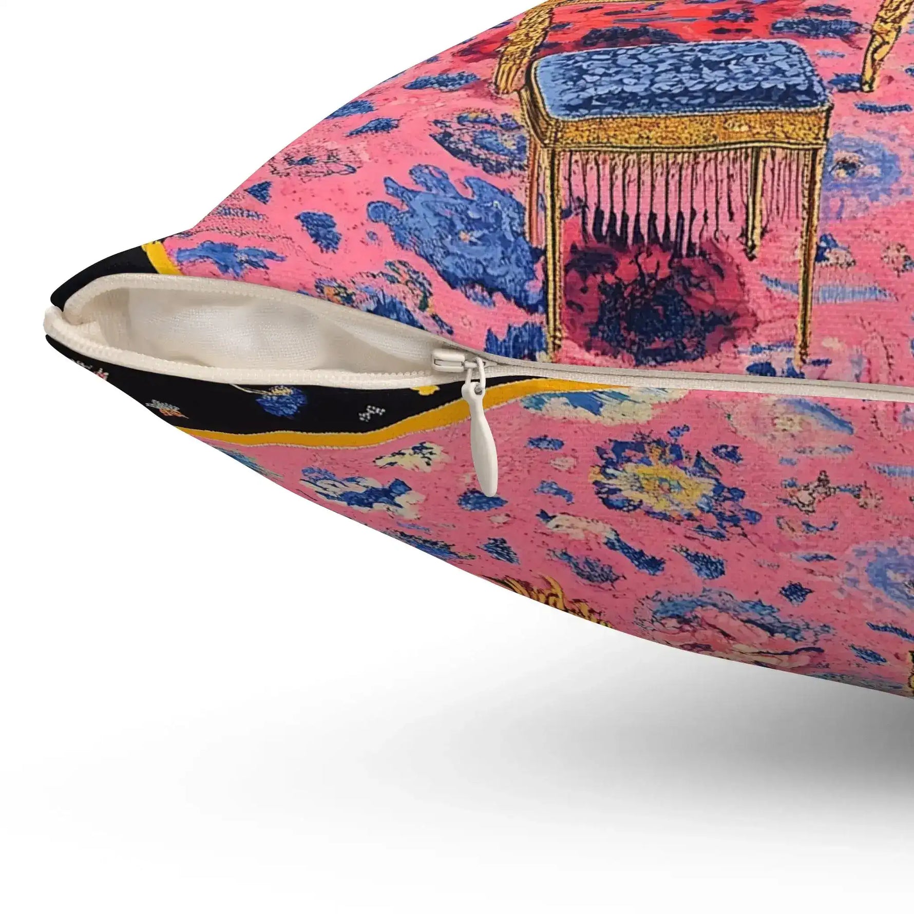 Close-up of Electric Bloom Throw Pillow corner and zipper, pink-and-blue illustrated room pattern with ornate furniture detail on fabric