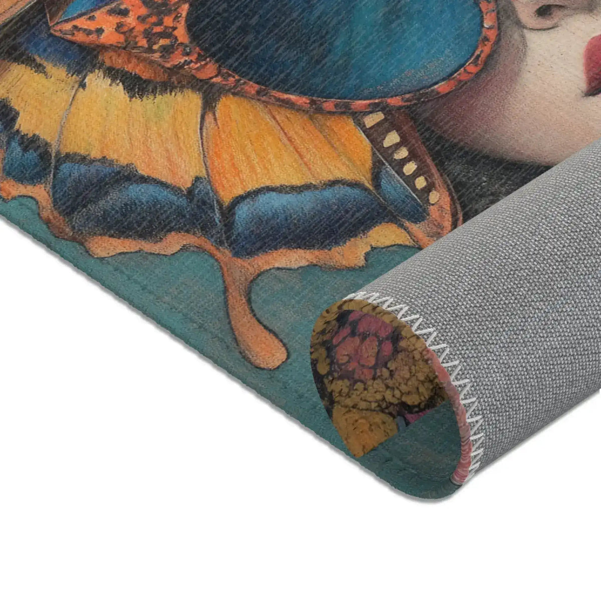 Macro rolled corner of Elegance in Flight Couture Butterfly Accent Rug revealing orange yellow butterfly wing teal face and grey backing
