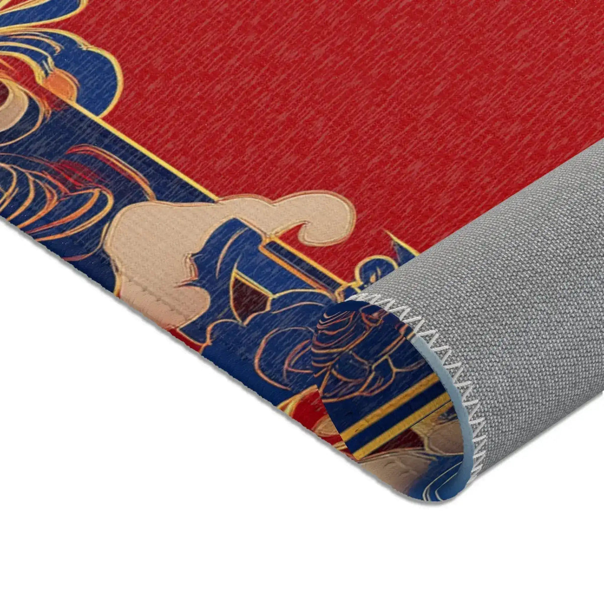 Close-up corner of Elegant Chinoiserie Red & Blue Accent Rug folded to show blue gold border detail and gray non-slip backing