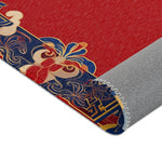 Corner fold detail of Elegant Chinoiserie Red & Blue Accent Rug showing surrealist portrait art and gray non-slip backing