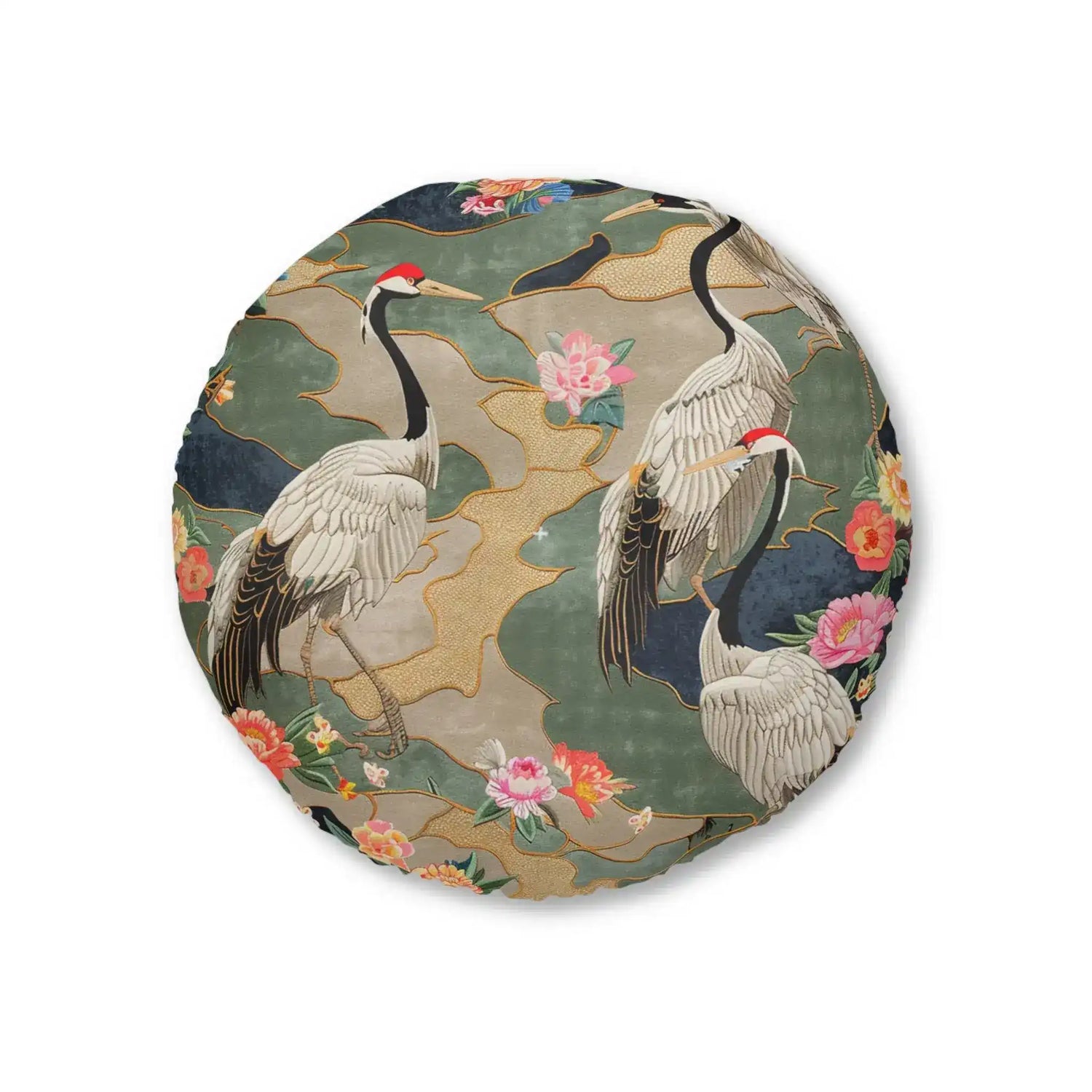 Round floor pillow featuring white cranes with gold-tipped wings amid sage green, navy, and pink cherry blossoms on a white background