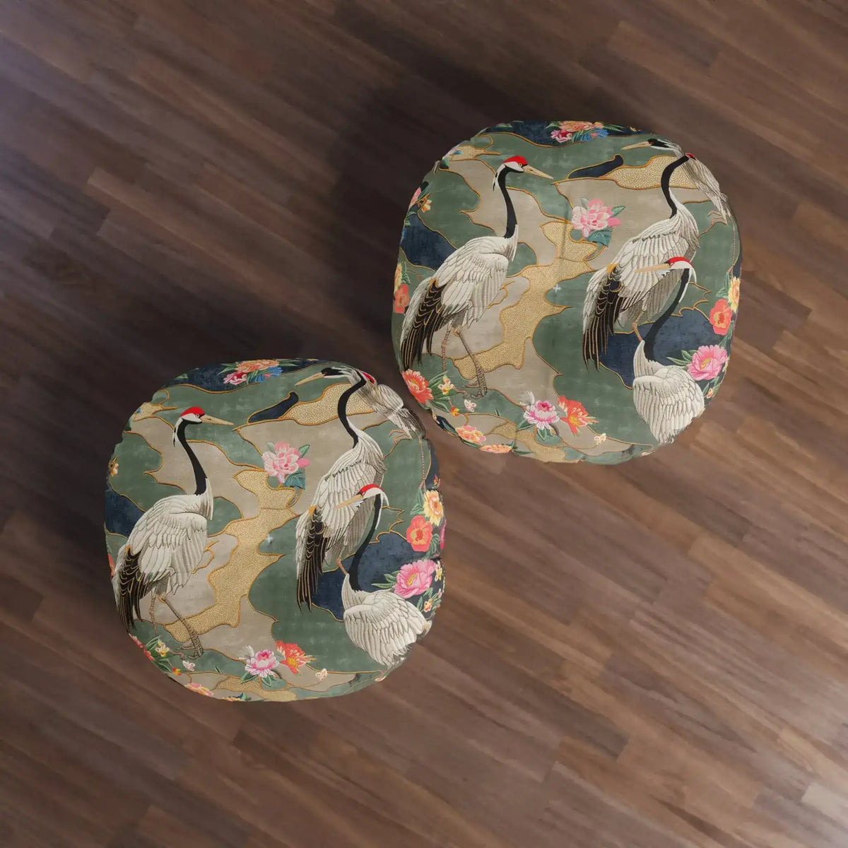 Two Elegant Crane and Floral Pattern Floor Pillows photographed overhead on dark wood floor slightly tighter zoom