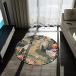 Elegant Crane and Floral Pattern round rug with crane birds and peony blooms on dark teal, placed in a dark modern living room with natural light
