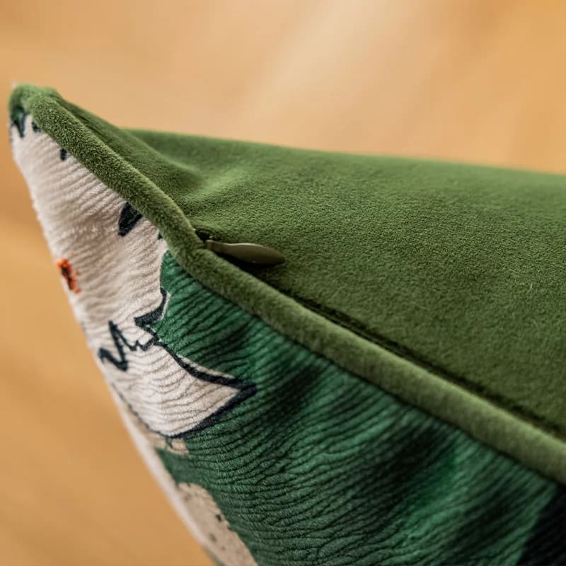 Elegant green leopard-print throw pillow cover with a hidden zipper detail.