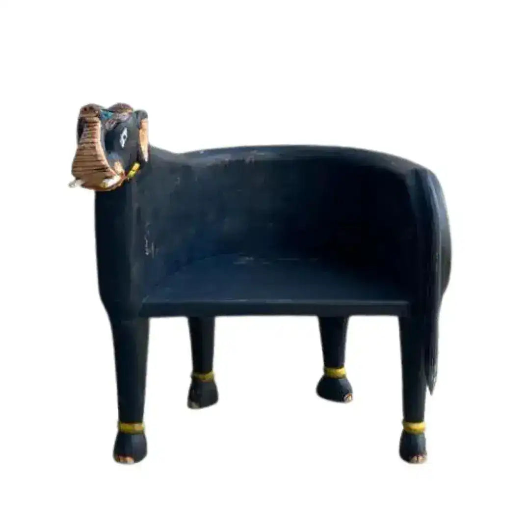 Hand crafted wooden elephant Maharaja chair in dark navy, right-front view with carved elephant head and gold ankle accents.