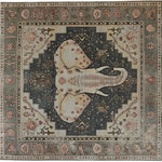 Top view of the Elephant Whisper Hand Tufted Rug, a large area rug featuring an intricate elephant design in the center, surrounded by ornate patterns in earthy tones. Perfect for adding a touch of elegance to living rooms, this wool rug combines style and comfort, making it an ideal choice for those seeking large area rugs for living room spaces.