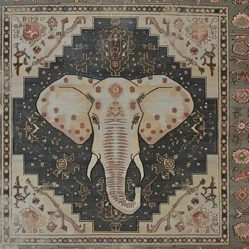 Top view of a hand-tufted wool area rug featuring an intricate elephant design. Ideal for large living rooms, this large area rug blends traditional motifs with contemporary style, making it a perfect centerpiece for any space.