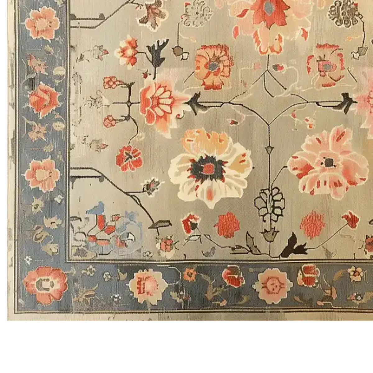 A beautifully detailed Elysian Bloom Knotted Wool Rug showcasing an intricate floral pattern with vibrant red, orange, and blue flowers on a soft gray background. The border features delicate floral motifs, enhancing the elegance of this area rug.